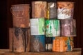 A collection of paint cans, buckets, toxic and hazardous material stacked. Hazardous waste Royalty Free Stock Photo