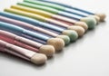 Collection of pastel colored makeup brushes lined up for eye shadow application and blending isolated on transparent background Royalty Free Stock Photo