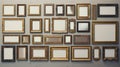 A collection of picture frames hanging on a wall. Suitable for home decor ideas Royalty Free Stock Photo