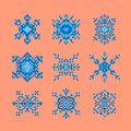 Collection of pixel art style snowflakes