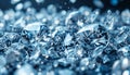 A collection of polished diamonds and gemstones, varying in size and shape,