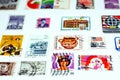 collection of Postage stamps from different countries and times background on a white background, old vintage retro Royalty Free Stock Photo