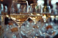 A collection of pristine wine glasses are lined up in a row on a table, awaiting to be filled with the perfect vintage Royalty Free Stock Photo