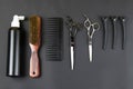 Collection of professional hair dresser tools arranged on dark background Royalty Free Stock Photo