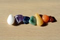 Collection of raw mineral stones in order and colors of chakras