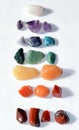 Collection of raw mineral stones in order and colors of chakras