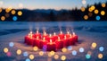 Red Candles in Snow at Dusk Royalty Free Stock Photo
