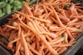 A collection of red carrots at a traditional market Royalty Free Stock Photo