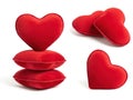 Collection of red heart-shaped pillows in various arrangements Royalty Free Stock Photo