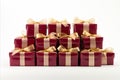 Collection of red and white gift wrapped presents with ribbon bows on white background Royalty Free Stock Photo