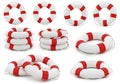 Collection of red and white striped life preserver rings arranged in various formations isolated on white background Royalty Free Stock Photo