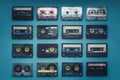 Collection Of Retro Audio Tapes On Blue Background, Top View. Retro Technology Music Concept Royalty Free Stock Photo