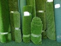 Collection of rolls of artificial turf hold together with plastic tape Royalty Free Stock Photo