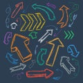 Collection of scribble arrows hand-drawn on a dark background. Vector Royalty Free Stock Photo