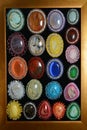 Collection of semi precious brooch on the wood frame Royalty Free Stock Photo