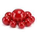 A collection of shiny red spheres of varying sizes arranged in a cluster isolated on white background Royalty Free Stock Photo