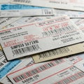 A collection of shipping labels and barcodes on paper slips. Each label features Royalty Free Stock Photo