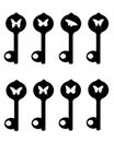 A collection of silhouettes of old keys with butterflies Royalty Free Stock Photo