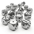 Collection of silver dice scattered randomly on a white background, game Royalty Free Stock Photo
