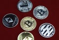 Collection of silver and gold cryptocurrency coins