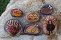 Collection of six small rocks painted for Thanksgiving