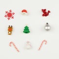 Collection of small christmas decoration: snowflake tree moose lollipop snowman silver ball on white background
