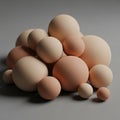 A collection of smooth, spherical objects in various sizes and soft hues of beige, Royalty Free Stock Photo