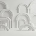 A collection of smooth, white arches and columns arranged in an abstract manner. Royalty Free Stock Photo