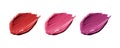 A collection of smudged lipsticks on a white background