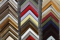 A collection of solid wood photo picture frame corner samples are displayed on a table Royalty Free Stock Photo