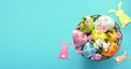 Collection of stylish colors eggs with flowers for Easter celebration on blue background. Royalty Free Stock Photo