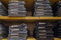 Stack of blue jeans in a shop.