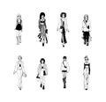 Collection of stylish young women dressed in trendy clothes. Vector fashion black and white illustration. Royalty Free Stock Photo