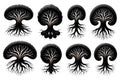 Collection of stylized black silhouette trees with intricate root systems Royalty Free Stock Photo