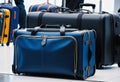 collection of suitcases and travel bags on a transport belt at the airport, bags of different styles, Royalty Free Stock Photo