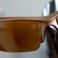 Collection of sunglasses on big reflection mirror Royalty Free Stock Photo