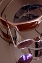Collection of sunglasses on big reflection mirror Royalty Free Stock Photo