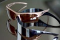 Collection of sunglasses on big reflection mirror Royalty Free Stock Photo