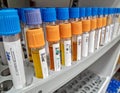 Collection of Test Tubes with Colored Caps in Laboratory Setting Royalty Free Stock Photo