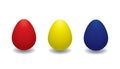 Collection of three colored Easter eggs on a white background.