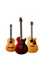 Collection of three guitars on a white isolated background. Royalty Free Stock Photo