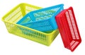 Collection of three plastic boxes of different colors and sizes. Royalty Free Stock Photo