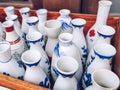 Collection of traditional Japanese ceramic white and blue sake pitchers or tokkuri