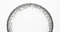 A collection of transparent soap bubbles forms a circular arrangement against a white background. Royalty Free Stock Photo
