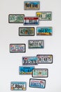 Collection of unregister car licence plates from various States in United States of America. Isolated on white background