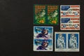 Collection of US postage stamp on black