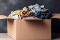 Collection of Used Clothes for Recycling, Donation, and Sale in a Cardboard Box, generative AI Royalty Free Stock Photo