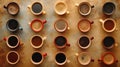 A collection of a variety of coffee cups arranged in rows, AI