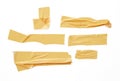 Collection of various adhesive tape pieces on white background.