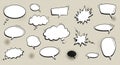 Collection of various comic-style speech and thought bubbles on a beige Royalty Free Stock Photo